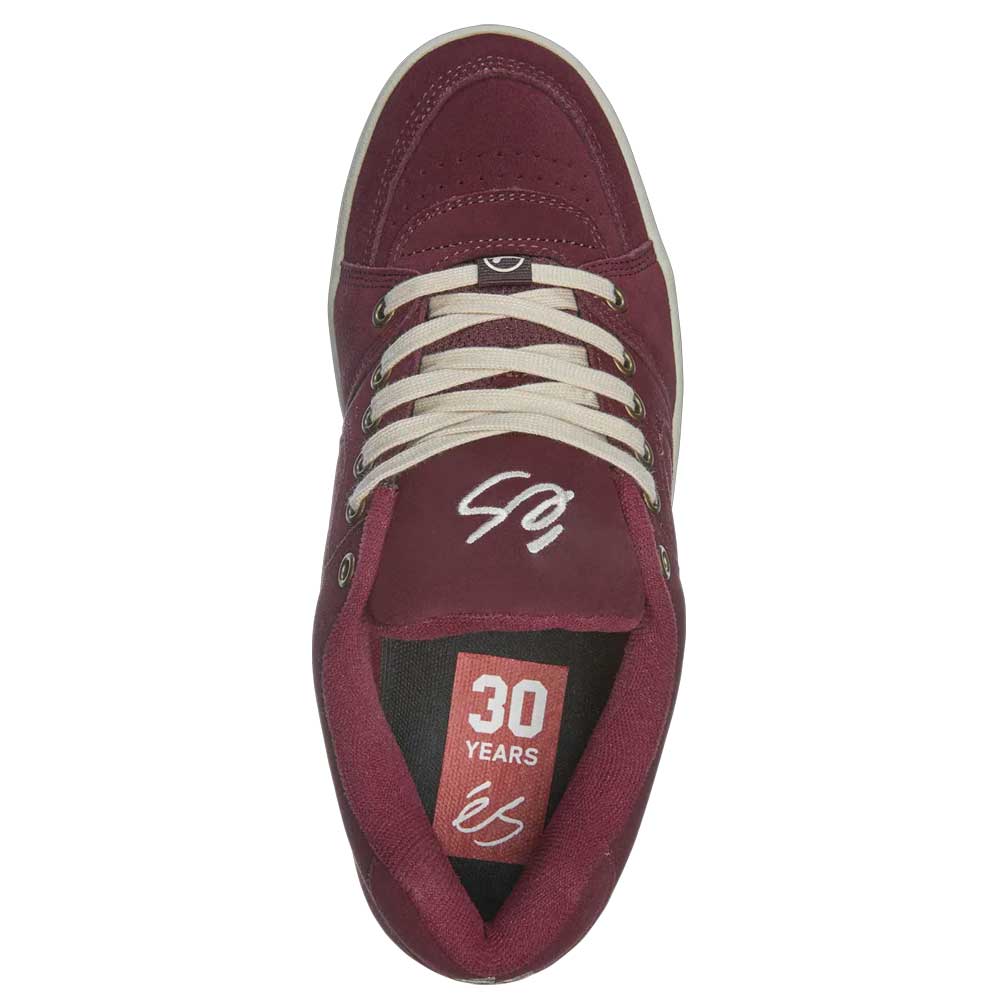The Accel Burgundy White Suede Es Shoes Skateboarding features white laces, éS branding on the tongue and insole, and "30 YEARS" in white text on the insole, highlighting its legacy in skateboarding style.