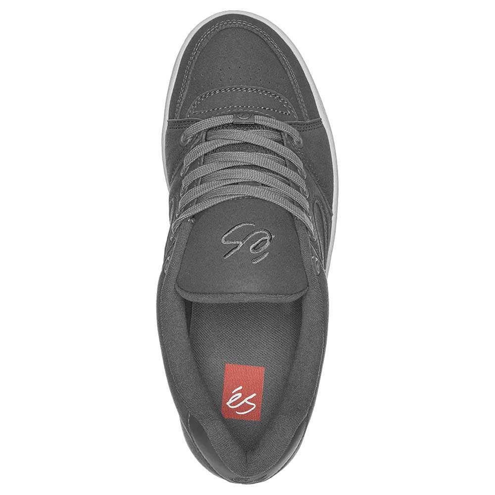 A top view of the Accel Gray White Suede Es Skateboarding Shoes shows gray laces, gray stitching, and a red insole with a white éS logo. The tongue features an embroidered éS branding in gray.