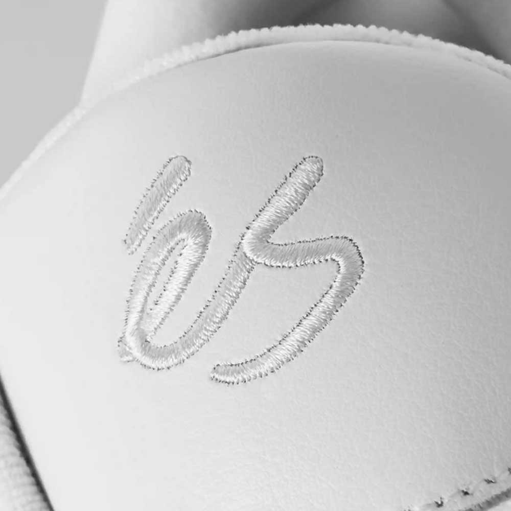 Close-up of the Accel White Leather Es Shoes Skateboarding, featuring white leather material with "es" embroidered in white thread—drawing inspiration from classic skate shoe designs and iconic skateboarding culture.