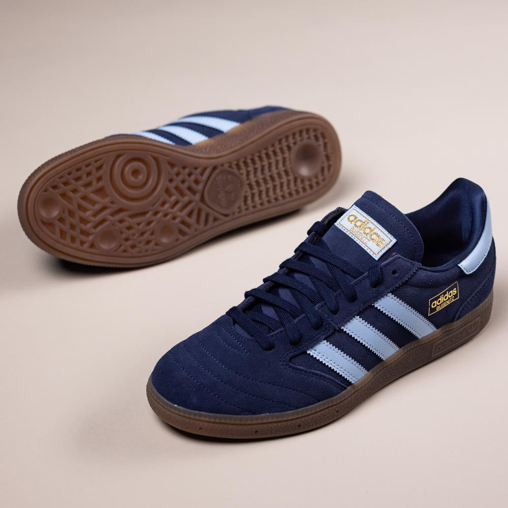 A pair of KJ5478 Blue Gum Busenitz Vintage Adidas Skateboarding Suede Shoes, featuring navy blue uppers, light blue stripes, and gum soles. One shoe shows the textured sole; the other highlights the iconic side profile.