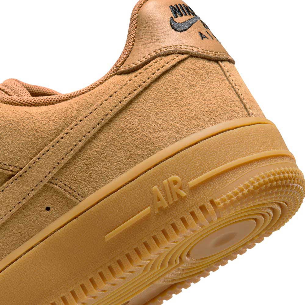 Close-up of the heel and sole of the Air Force 1 Flax Black Gum Light Brown HM8517200 Nike SB Suede Skateboarding Shoe, showing "AIR" on the midsole, heel Nike logo, textured suede, black gum outsole, and signature Nike Air cushioning for skateboarding.