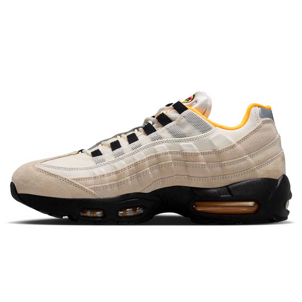 The Nike SB Air Max 95 Sail Black Laser Orange IQ8395100 features mesh and suede panels, a wavy layered design, black sole, visible air units, and classic skateboarding shoe inspiration with beige, black, and orange accents.