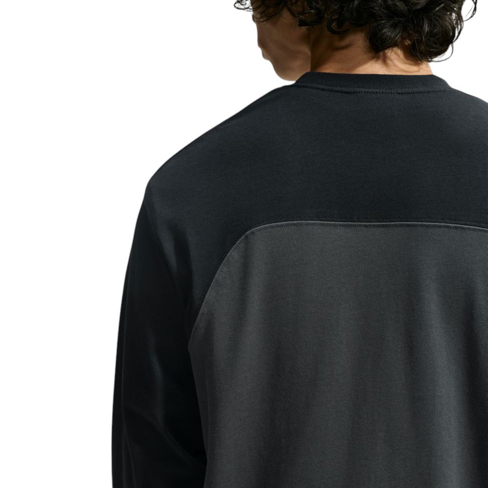 Back view of a Nike SB Airmail Longsleeve IM5430060 Black Gray Skate Longsleeve T-Shirt, a midweight cotton long-sleeve shirt with a black upper section and gray lower section for durable comfort.