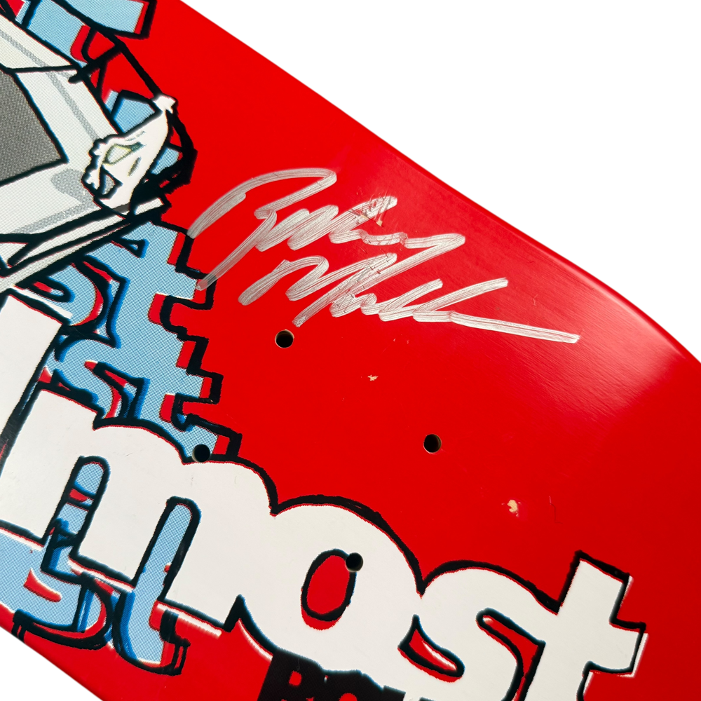 A close-up of the Almost Round Three Rodney Mullen Daewon Song Skateboard Deck 7.4x31 Signed Collectible, featuring red, white, and blue graphics with a silver signature above the word "Almost.