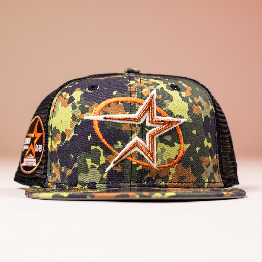The Fleck Black True Houston Astros New Era 5950 Fitted Hat features a bold orangewhite star front logo, side star patch, black mesh panels, and classic fitted style—perfect for Astros fans.