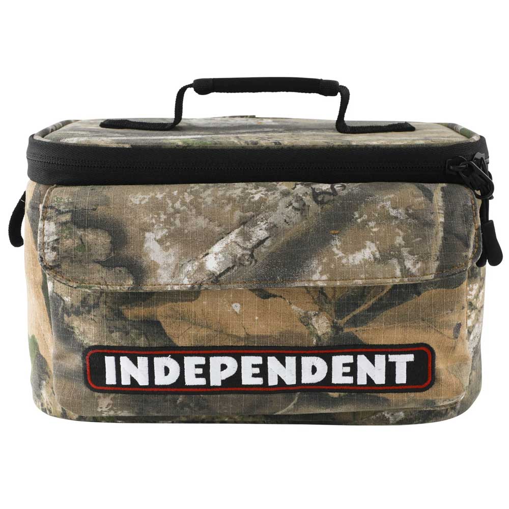 Camo-patterned rectangular bag with a black top handle and zipper, featuring a bold INDEPENDENT bar logo patch on the front over a red and black background—this Bar Logo 5 Liter Independent x Realtree Cooler Unisex is the perfect REALTREE APX insulated cooler for fans of Independent Trucks accessories.