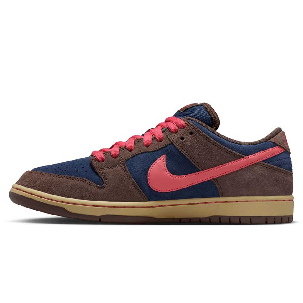 The Baroque Brown Adobe Midnight Navy Dunk Low Pro HQ1625200 Nike SB Suede Shoes feature a navy and brown suede upper, pink Swoosh and laces, beige midsole, and brown rubber outsole, displayed in side profile.