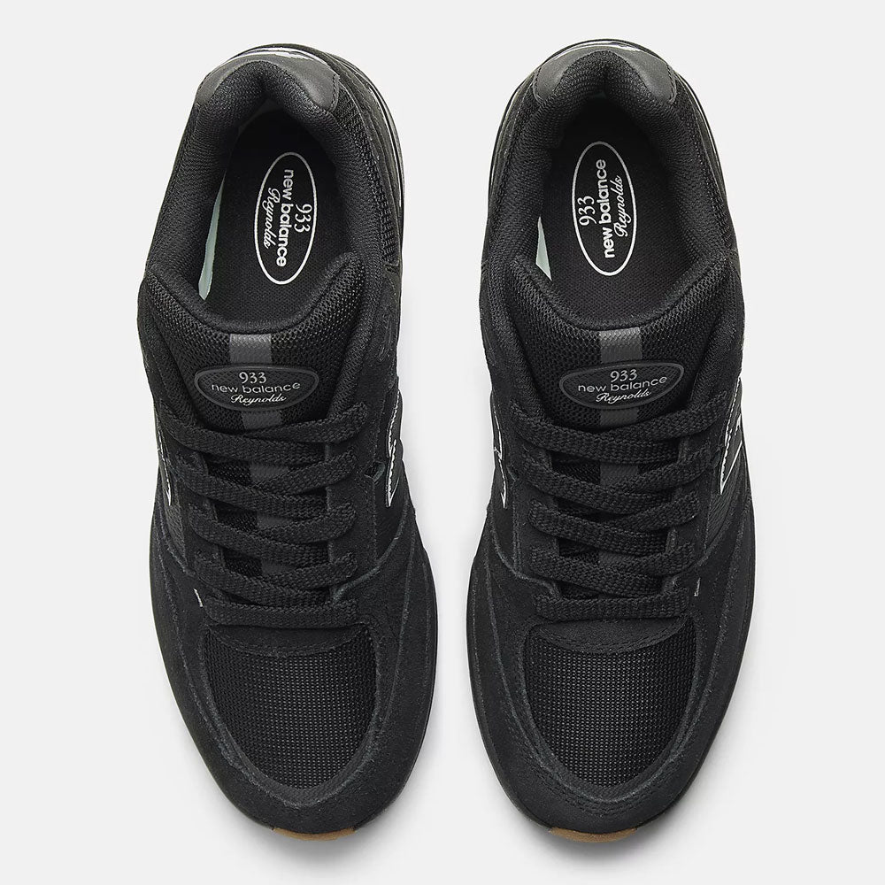 A pair of Black 933 NAP New Balance Numeric Suede Skateboarding Shoes viewed from above, highlighting the laces, suede uppers, and 933 labels on the tongues—classic skate style—set against a plain white background.