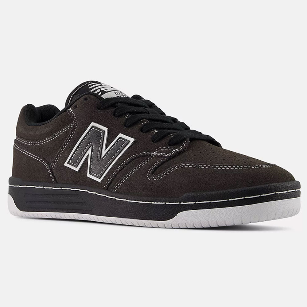 The Black Cement 480 CSS New Balance Numeric Suede Skateboarding Shoes feature white stitching, a large white N logo, black laces, and a white and black FuelCell foam sole, shown against a plain light gray background.