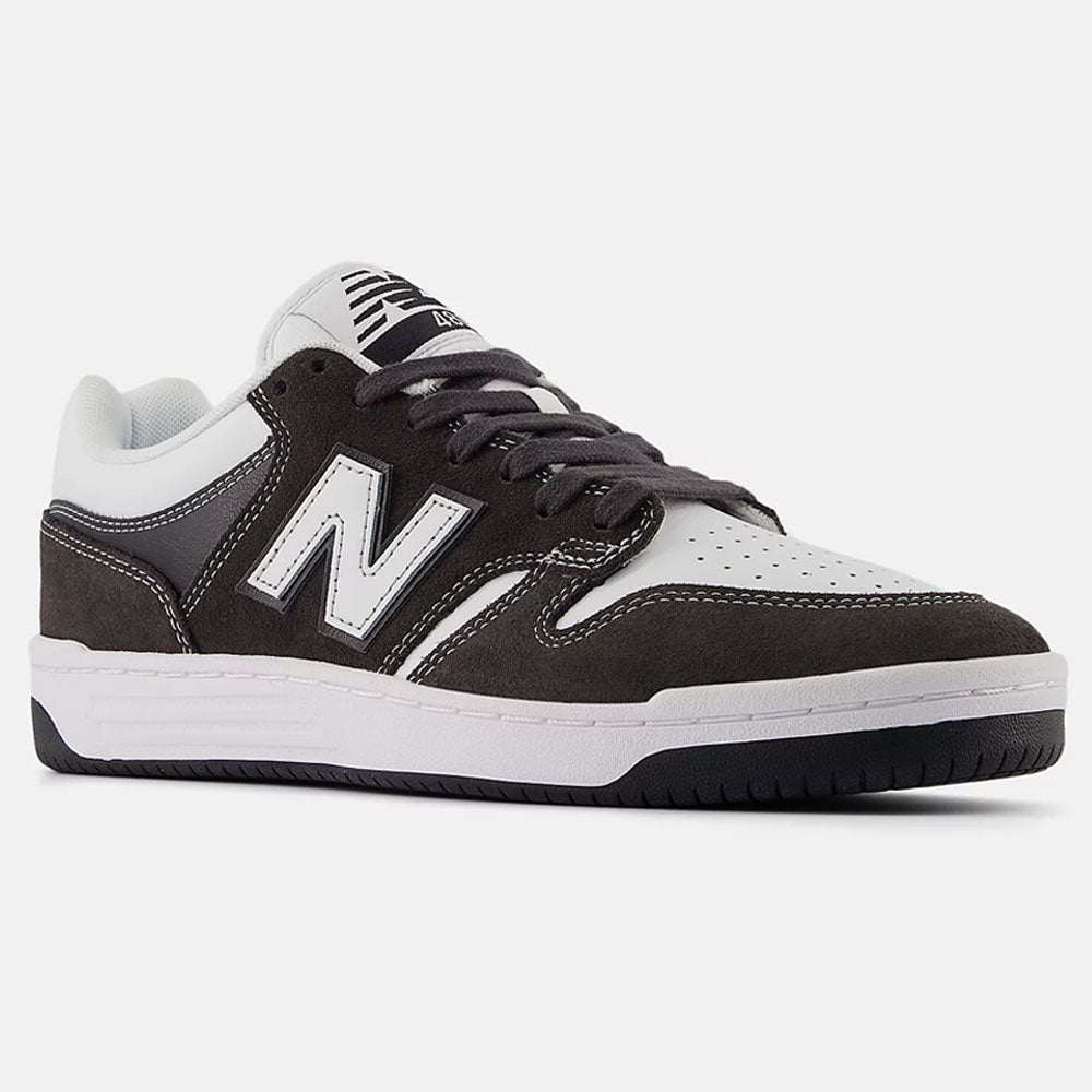 The Black Cement White 480 BAB New Balance Numeric Suede Skateboarding Shoe features a lightweight black and white suede finish, white N logo, white sole, black outsole, and is shown on a plain white background.