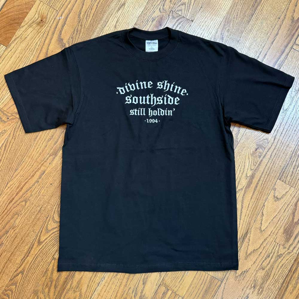 The Black Divine Shine x Southside Still Holdin Max Heavyweight Tee features embroidered gothic text, perfect for fans of classic streetwear and Southside Skatepark culture.