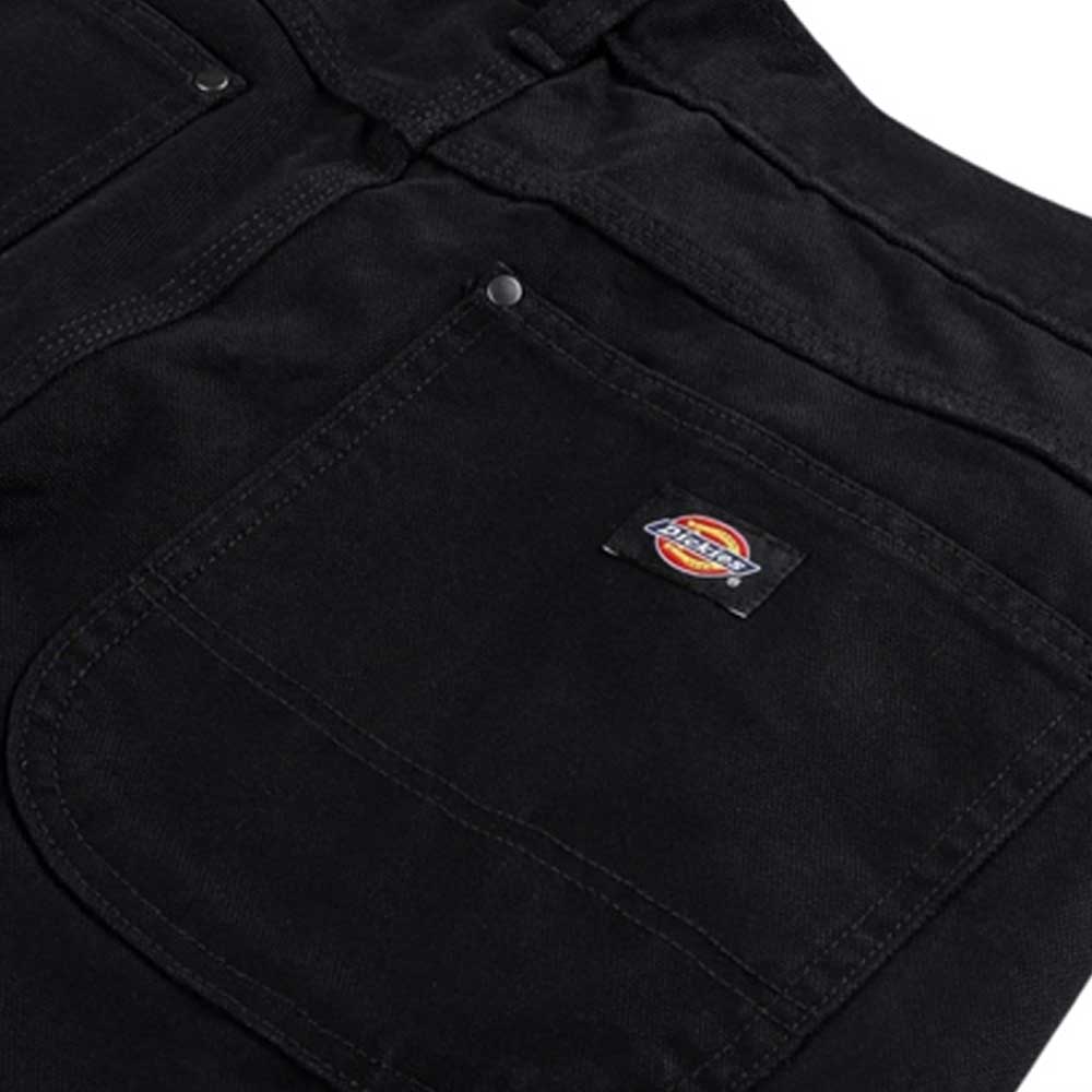 Close-up of Black Duck Pant Thrasher Magazine x Dickies Skateboarding A88OP BLK showing a front pocket with a small rectangular Dickies logo patch sewn above it.