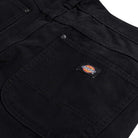 Close-up of Black Duck Pant Thrasher Magazine x Dickies Skateboarding A88OP BLK showing a front pocket with a small rectangular Dickies logo patch sewn above it.