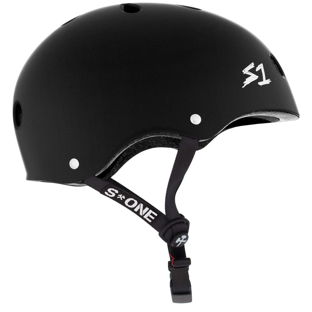 The Black Matte MEGA Lifer S1 Helmet S ONE CPSC features ventilation holes, an adjustable chin strap, the white S1 logo on the side, and is made with EPS Fusion Foam for dual certified protection.