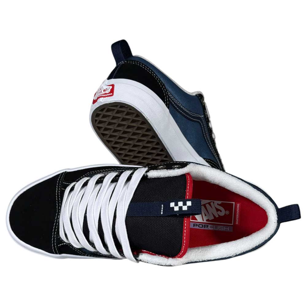 A pair of Black Navy Skate Old Skool 36+ Vans Suede Shoes featuring white laces and soles, red inner lining, Vans branding on the tongue and heel, and a waffle-patterned rubber outsole. One shoe is upright, the other on its side.
