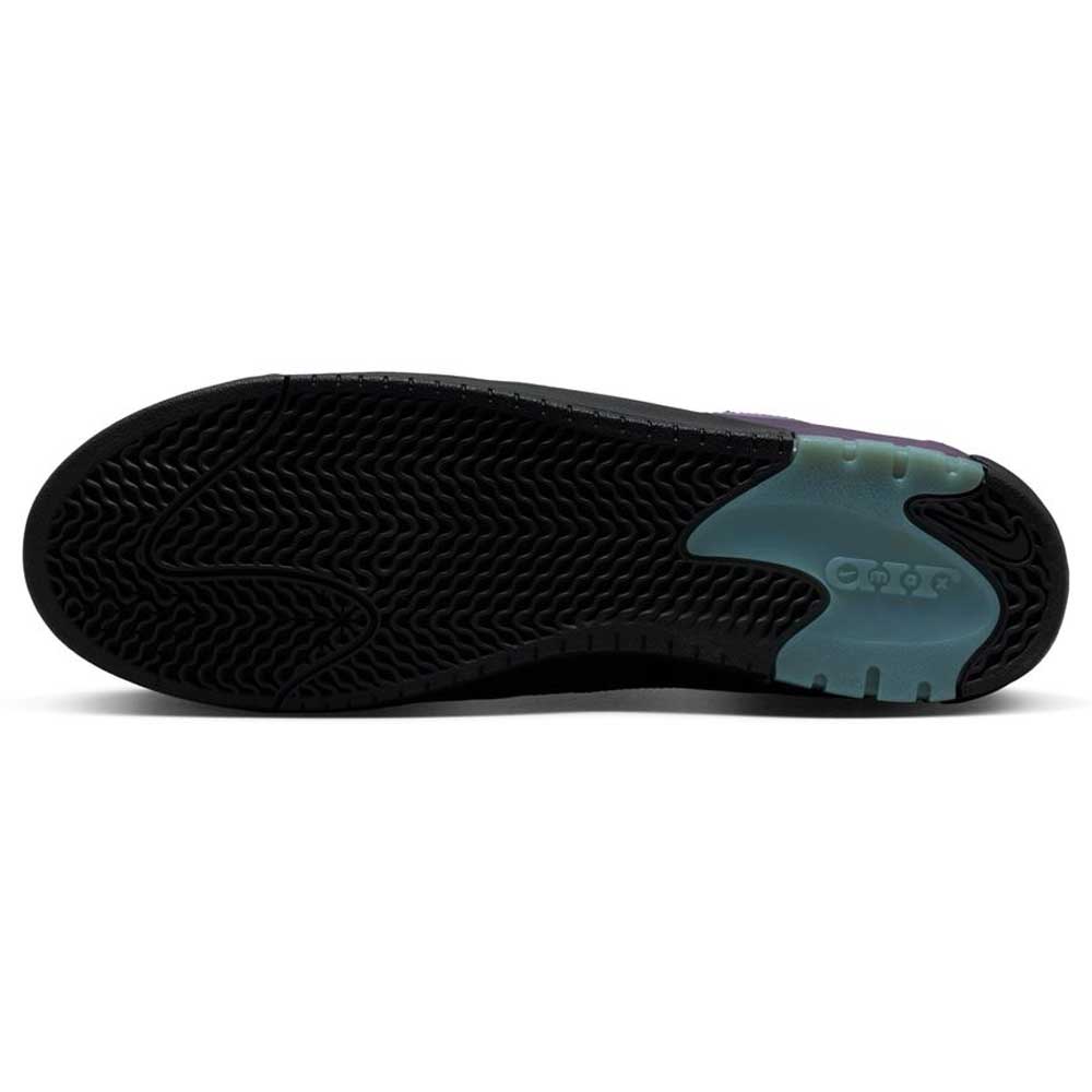 The image shows the black rubber outsole of the Black Noble Purple IR1887500 Air MAX Ishod Nike SB Skateboarding Shoes, featuring a textured grip and a translucent light blue heel section with raised AIR lettering over Max Air cushioning.