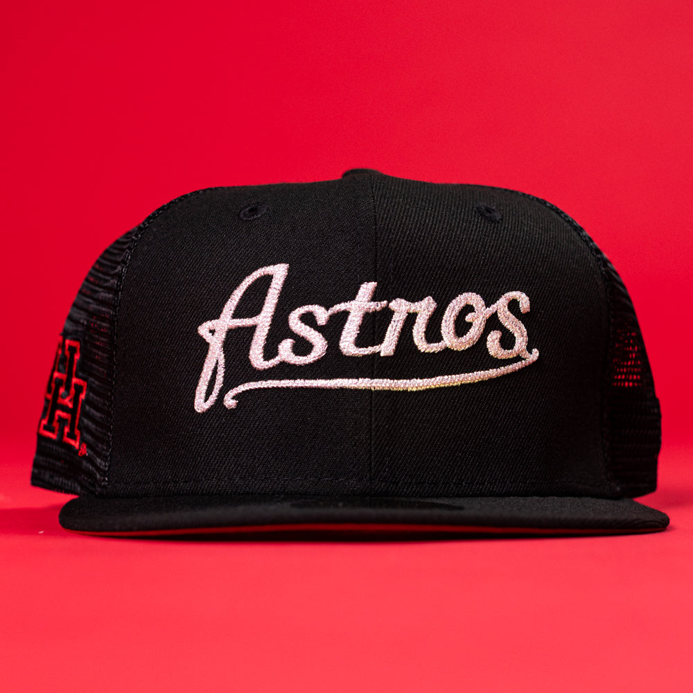 A Black Scarlet Trucker Houston Cougars New Era Hat 5950 Fitted, featuring white script embroidery on the front, is shown against a solid red background.