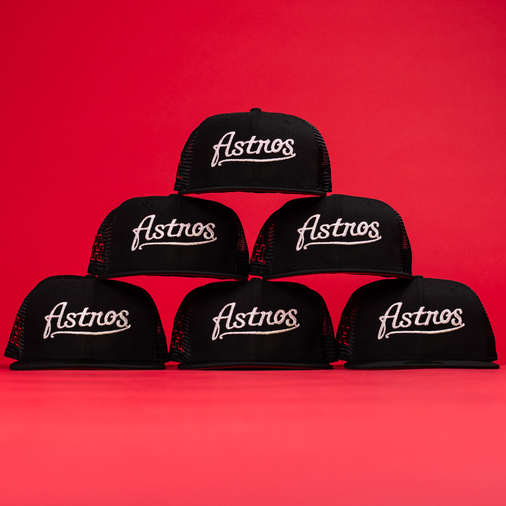 Six Black Scarlet Trucker Houston Cougars New Era 5950 Fitted Hats are arranged in a pyramid against a red background, showcasing bold school spirit and classic style for dedicated fans.
