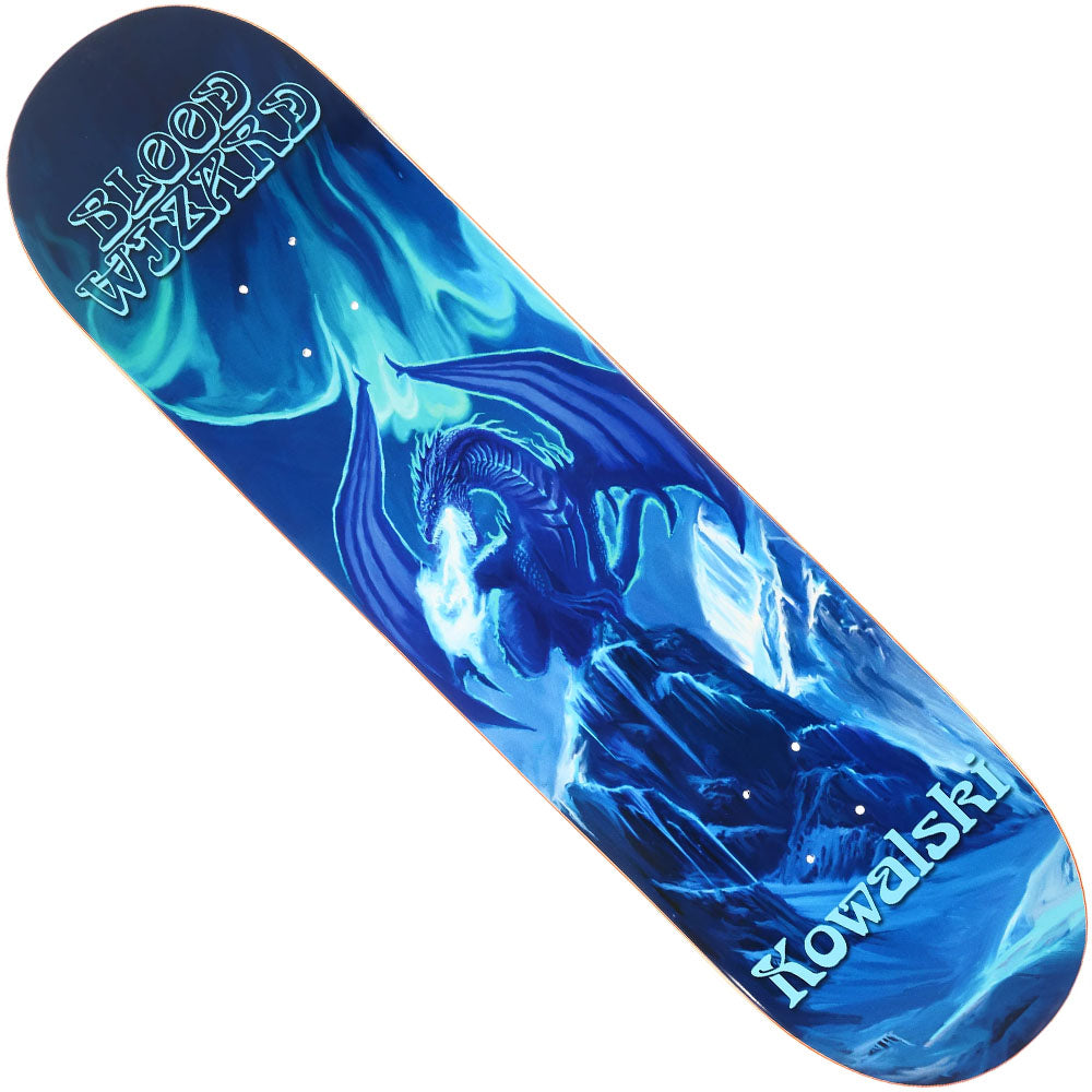 The Kowalski Front 8.5x32.3 Deck from Blood Wizard Skateboards features cool blue shades, an icy dragon graphic, and stylized BLOOD WIZARD at the top with Kowalski at the bottom.