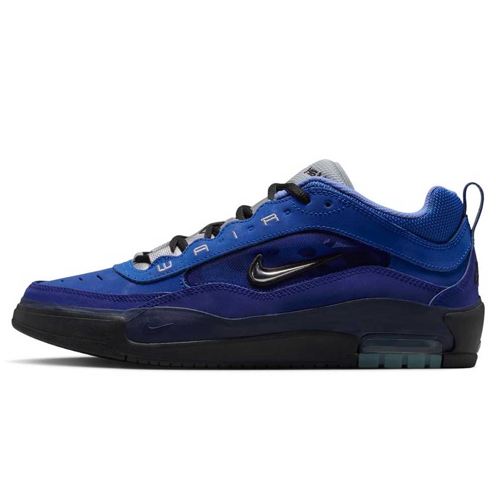 The Blue Void Metallic Silver IR1887400 Air MAX Ishod Nike SB Skateboarding Shoes feature a low-top blue and black design with mesh and suede, black laces, a black Swoosh, AIR lettering, Max Air heel cushioning, inspired by the original Air Max Ishod.
