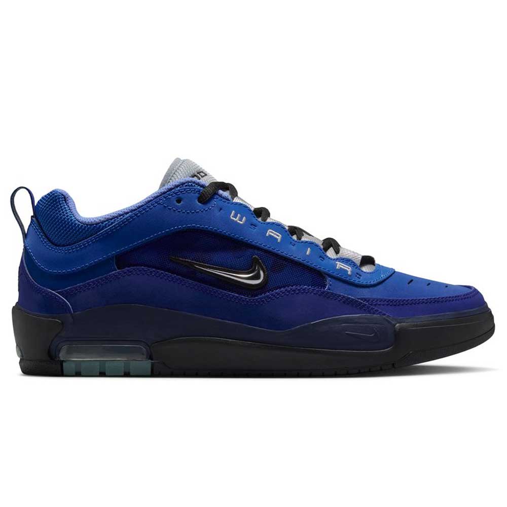 A side view of the Blue Void Metallic Silver IR1887400 Air MAX Ishod Nike SB Skateboarding Shoes, featuring black and silver accents, a black sole, visible Max Air cushioning, and AIR text along the laces—ideal for skate fans.