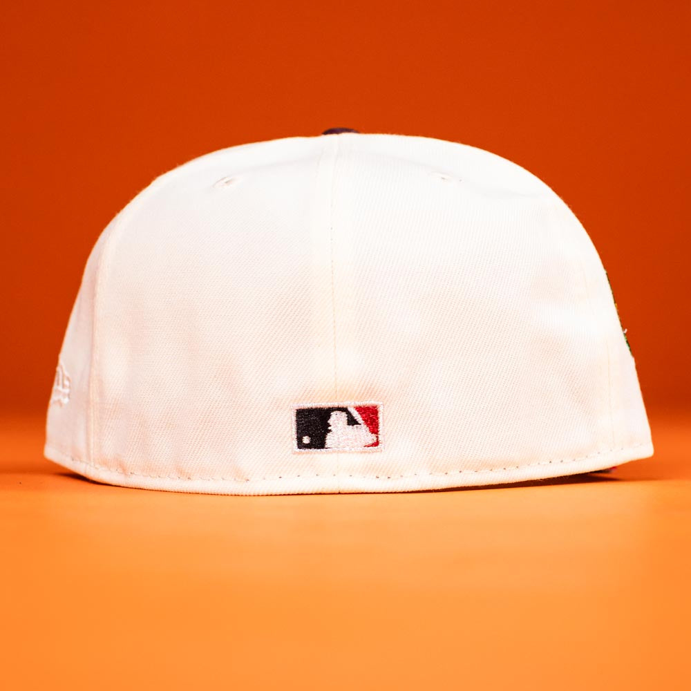 A white Poppa Burger Bo Bundy 35th Houston Astros Bo New Era 5950 Fitted Hat, shown backward on an orange background, showcases the MLB logo—ideal for fans seeking a classic look.