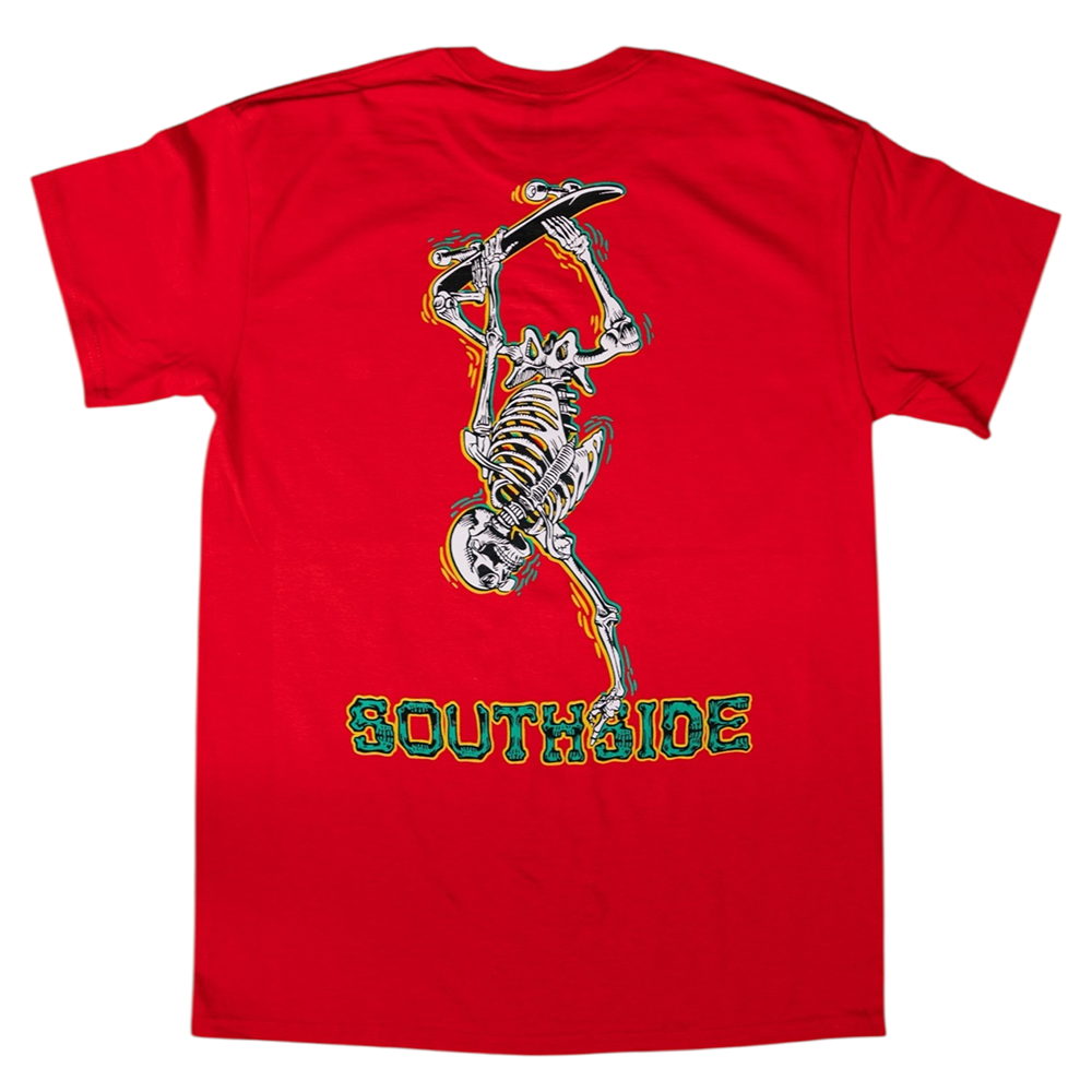 The Bones Pack Ben Raybourn Red Southside Skatepark Tee features a skeleton skateboarding upside down and bold SOUTHSIDE text in green and yellow. Crafted from soft USA cotton for comfort and style.