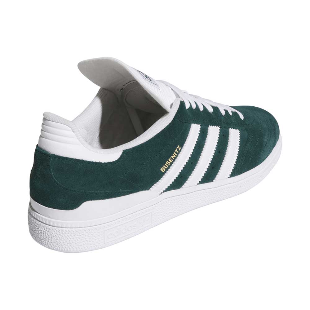 The Busenitz HQ7534 Green White Adidas Skateboarding Suede Shoes feature a durable green suede upper with white stripes, a textured white sole, and "BUSENITZ" in gold on the side, shown at an angle to highlight back and side details.