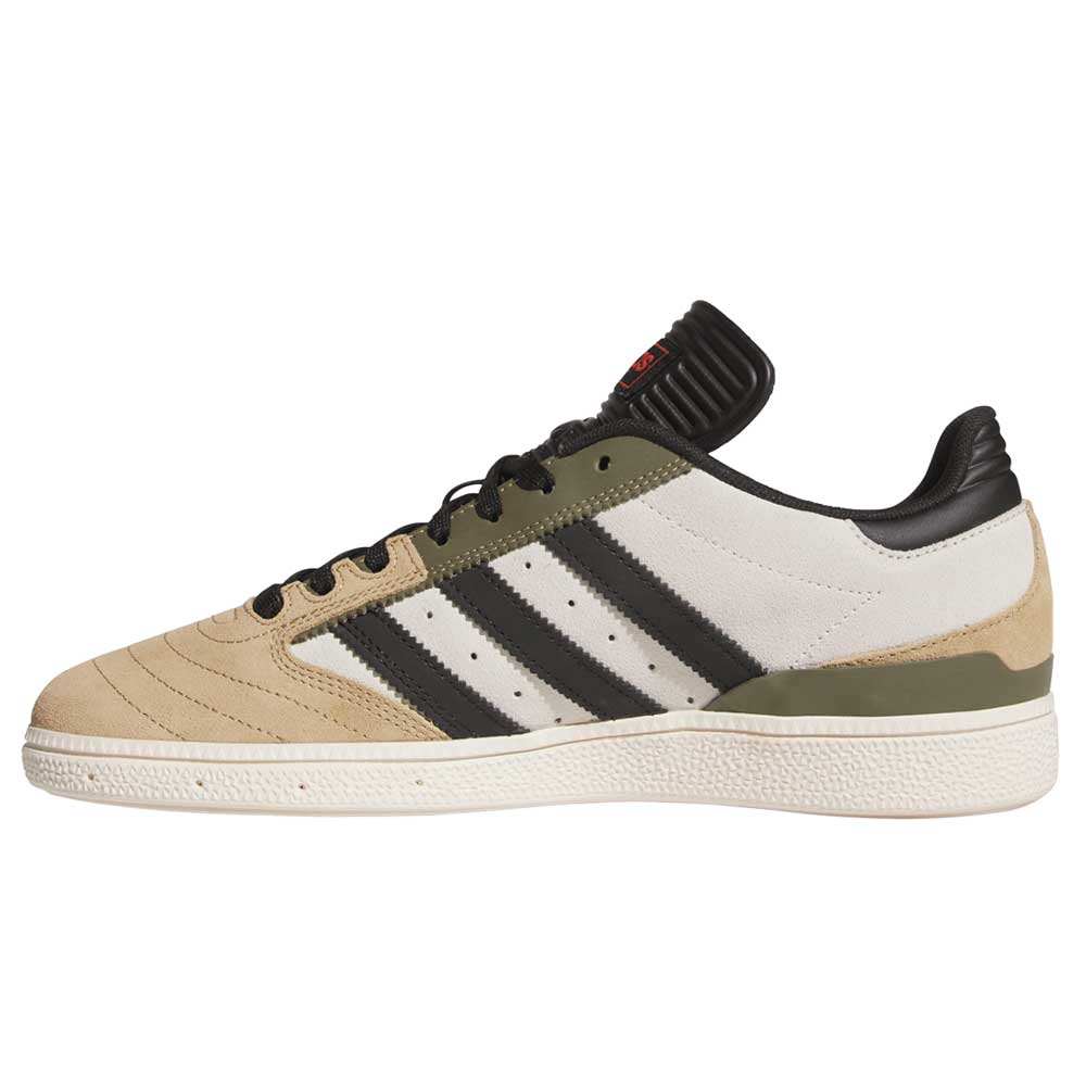 The Busenitz Tan White Black HQ4746 Adidas Skateboarding Suede Shoes feature beige, white, and olive-green suede with black stripes and laces, plus a textured white sole, shown from the side.