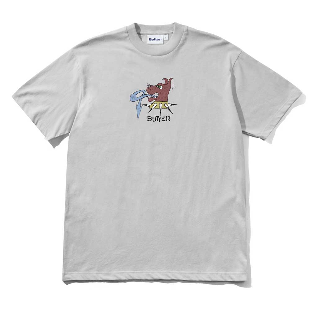The Canine Cement Tee Butter Goods features a light gray design with a cartoon red creature holding a blue frisbee above the word "BUTTER" on the chest.