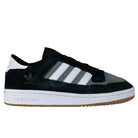 The Adidas Skateboarding Centennial 85 Low ADV sneaker in black, gray, and white features suede uppers, white stripes, and a white sole. The Adidas logo appears on the heel and side.