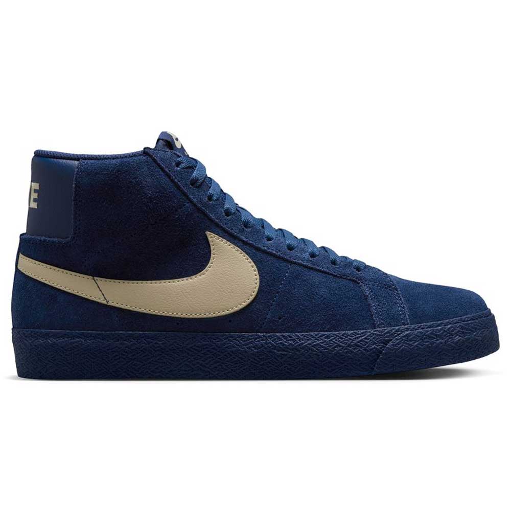 The Coastal Blue Pale Yellow IO0667400 Blazer Mid Nike SB suede skateboarding shoes feature a navy blue high-top design, pale yellow swoosh, matching navy laces, and textured navy sole, crafted for responsive cushioning.