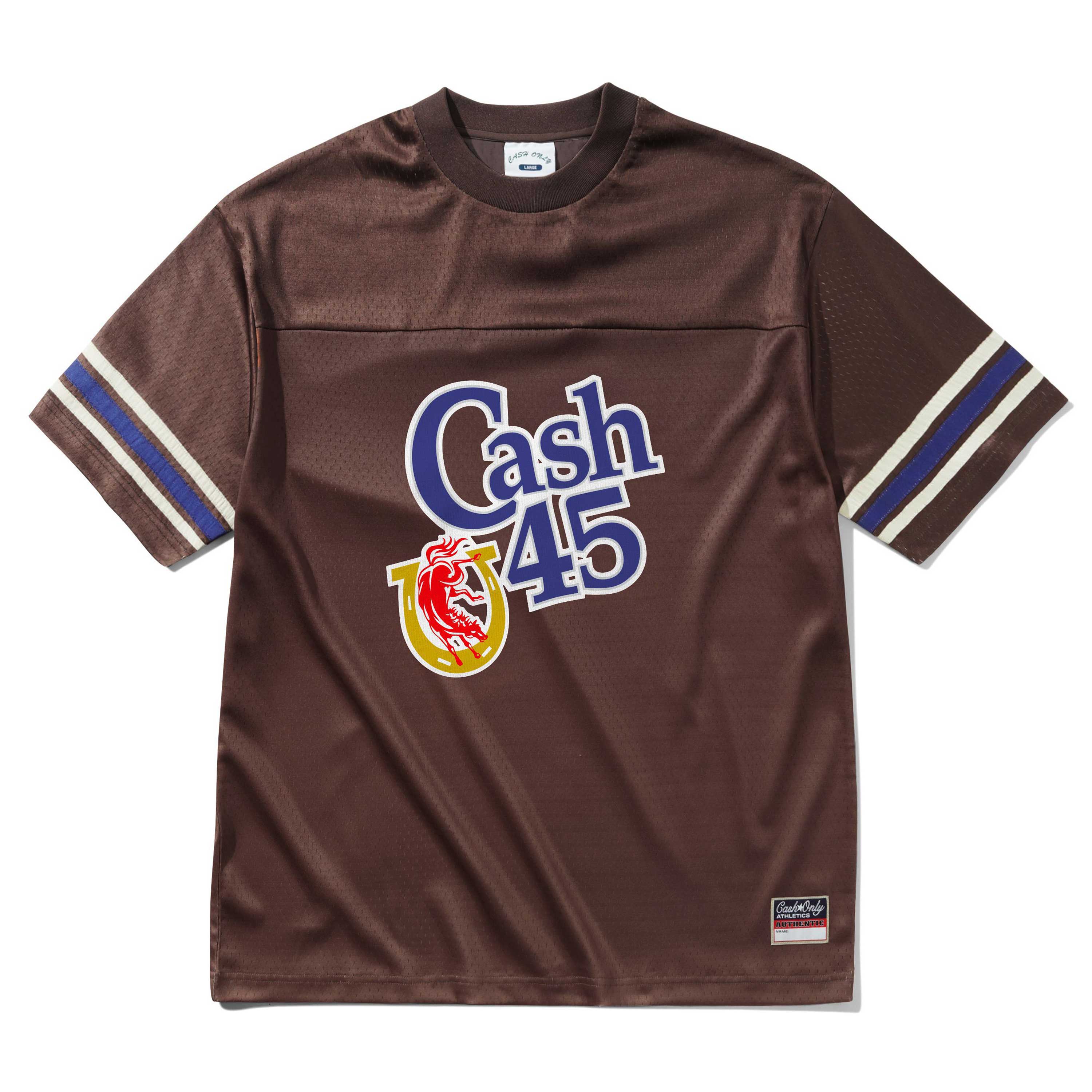The Colt Jersey Brown Cash Only is a brown short-sleeve polyester jersey with blue, white, and tan sleeve stripes, featuring "Cash 45" and a red lion crest on the front, plus a ribbed collar and a woven label patch at the lower left hem.
