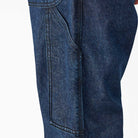 Close-up of DDSK68 Loose Fit Denim Pant Carpenter Dark Wash Dickies Skateboarding, featuring visible stitching and a side pocket, with a relaxed fit against a plain white background.