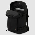 The A8675BLK Black Mike Anderson Pro Skate Dickies Skateboard Strap Backpack, featuring a flap pocket, skate straps, and a padded laptop compartment, is shown against a plain light gray background.