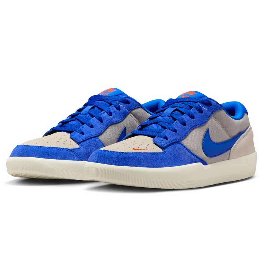 The DV5477-011 Force 58 Nike SB Skateboarding Shoes feature college grey and racer blue suede overlays, white soles, blue swooshes and laces, plus orange accents on the tongue and toe for a heritage basketball-inspired look.