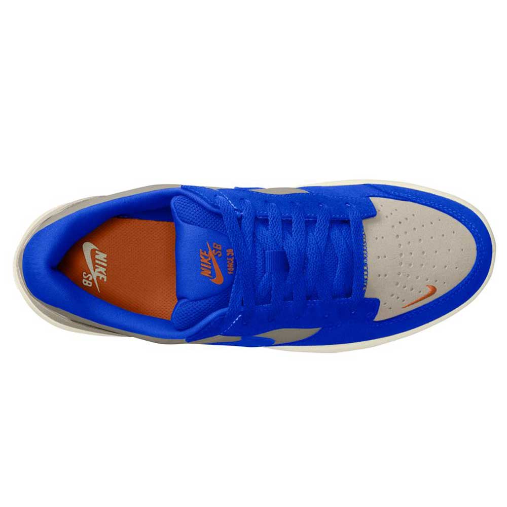 Top view of the Nike SB Force 58 in College Grey/Racer Blue/Light Orewood, a suede skateboarding shoe with a blue upper, beige toe box with orange Swoosh, blue laces, and an orange insole featuring Nike SB branding.