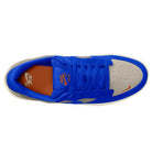 Top view of the Nike SB Force 58 in College Grey/Racer Blue/Light Orewood, a suede skateboarding shoe with a blue upper, beige toe box with orange Swoosh, blue laces, and an orange insole featuring Nike SB branding.
