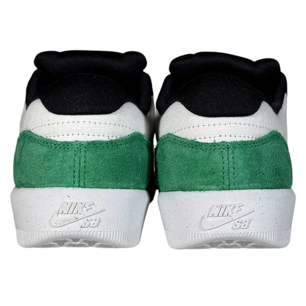 Back view of the Nike SB Force 58 White Black Stadium Green suede skate shoes shows green suede heels, white cupsoles, black ankle padding, and the Nike SB logo embossed on the sole's heel.
