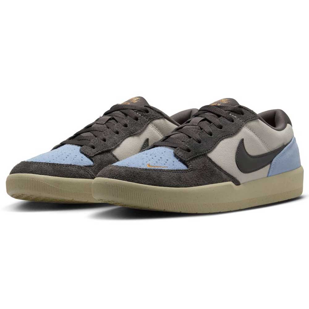 The DV5477102 Light Orewood Brown Medium Aah Force 58 Nike SB Suede Skateboarding Shoes feature light blue suede toes, dark brown overlays, gray panels, black Swooshes, and a gum sole—ideal for skateboarding.