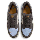 Top view of DV5477-102 Light Orewood Brown Medium Aah Force 58 Nike SB suede skateboarding shoes featuring light blue toe boxes, dark gray overlays, black Swooshes, brown tongues/linings, white side panels, and gum outsoles.