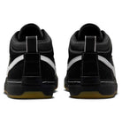 The DX4361-005 Black Gum Leo Baker React Nike SB skate shoes feature black suede and leather uppers, white stitching, white side accents, black pull tabs on the heels, and durable gum-colored outsoles for skateboarding.