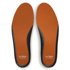 Orange and black insoles from the Leo Baker x Nike SB DX4361202 Dark Rust White React skateboarding shoes, featuring "Leo Baker" and "Nike Skateboarding" in white on each heel.