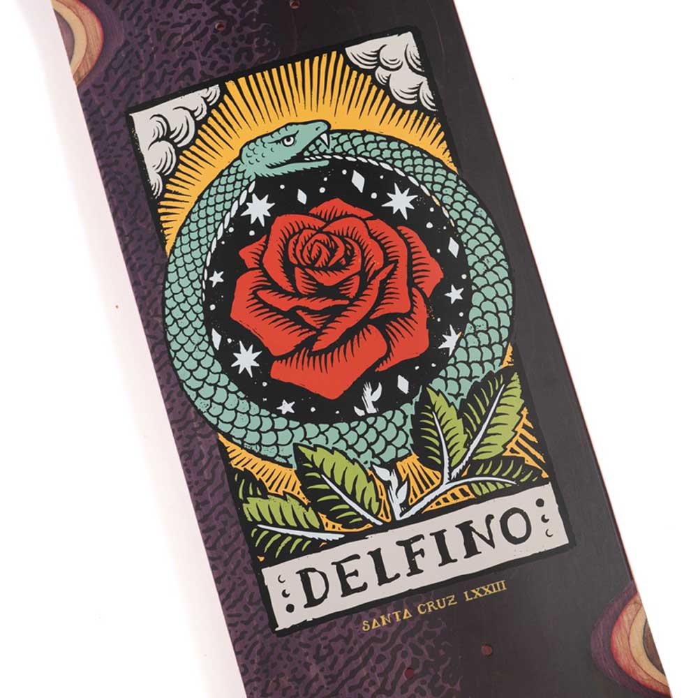 Illustration of a green snake encircling a red rose with leaves and stars, set against a black and white background. Beneath the image, the text reads Delfino Ouroboros Pro 8.25in x 31.60in Santa Cruz Decks, highlighting the premium construction of this 7-ply skateboard deck.