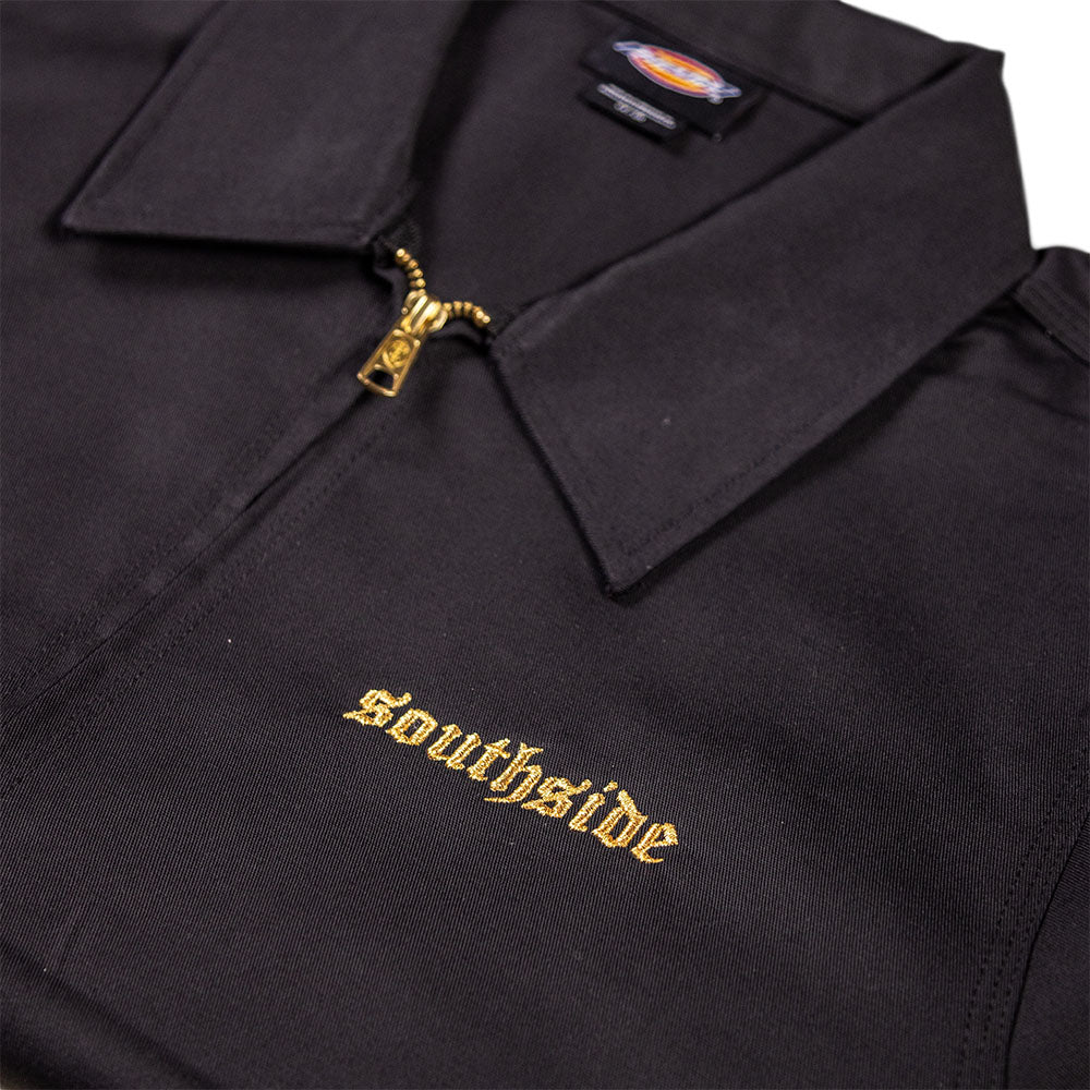 A close-up of the Black Gold Embroidered Old English Black Southside Dickies Unlined Eisenhower Jacket, showcasing a gold zipper and "Southside" in gold embroidery on the front, with the Dickies tag visible at the neckline.