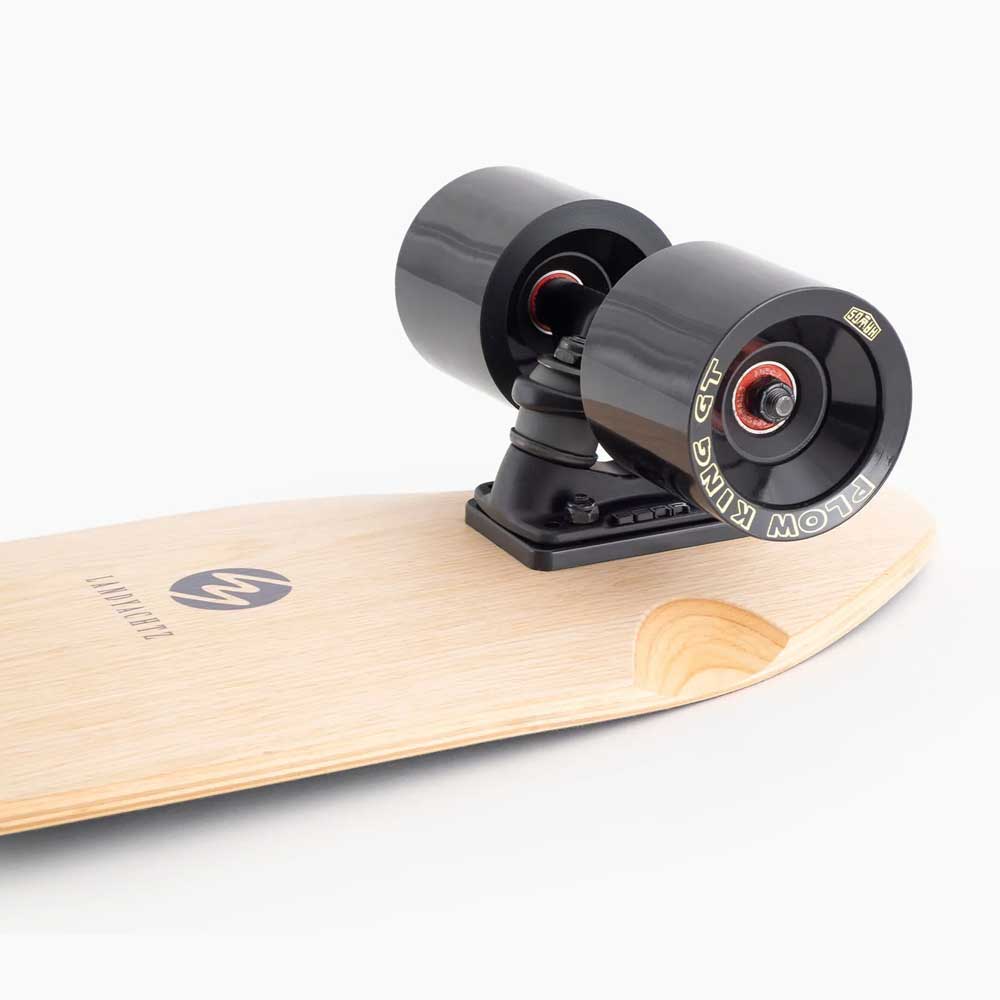 Close-up of the rear wheels and truck on the Dinghy Classic Fender Moray Eel Landyachtz Complete Skateboard, featuring black Blow King GT wheels, black hardware, and molded wheel flares like those on the Dinghy Fender.