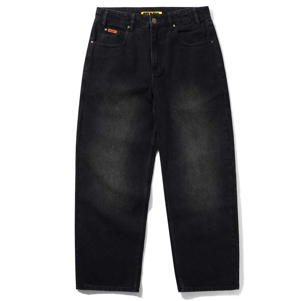 Distressed Flat Black Relaxed Denim Jeans by Butter Goods, featuring a slightly faded wash, front pockets, visible seams, and laid flat on a white background.