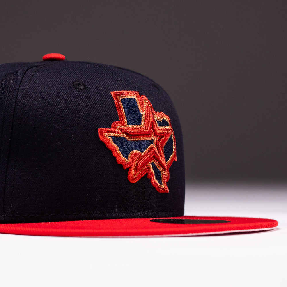 The El Karma ASG Navy Red Houston Astros New Era Hat 5950 Fitted features a bold black and red design with an embroidered outline of Texas on the front, accented by a star and lines in red, yellow, and navy—a tribute to Houston Astros pride.