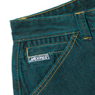 Close-up of the front pocket area of Eyes Green Overdye Denim Krooked Pant, featuring yellow stitching and a small white YAROSWED label near the pocket for classic krooked pant vibes.