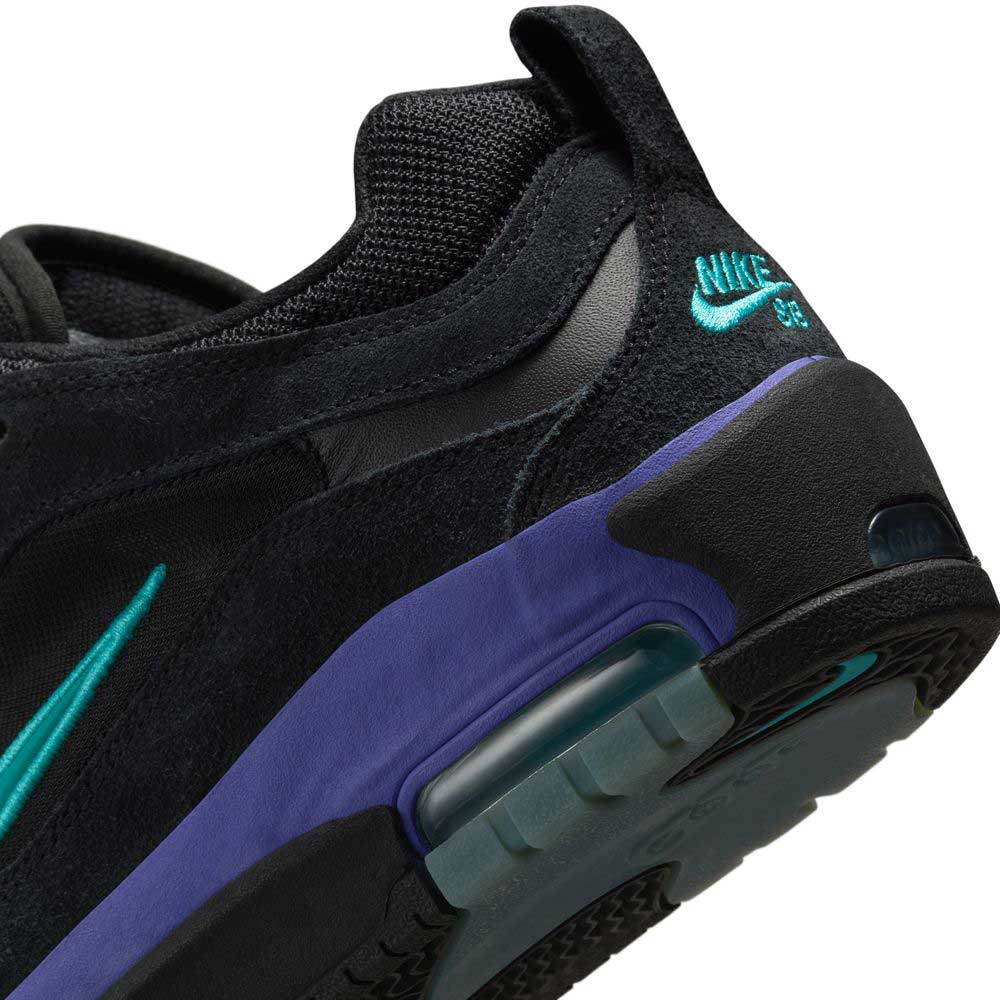 Close-up of FB2393003 Dusty Cactus Black Air Max Ishod Wair Leather Suede Shoes, featuring a teal logo, purple midsole, visible Max Air unit, black mesh and suede details, plus a heel tab and NIKE SB branding.